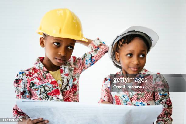 african twin girls in classroom - class rules stock pictures, royalty-free photos & images