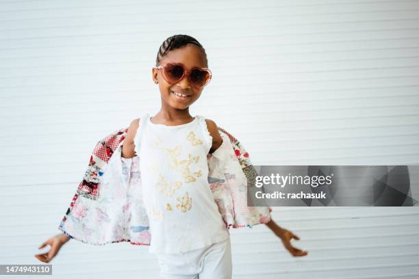 girl wearing sunglasses against - kids fashion show stock pictures, royalty-free photos & images