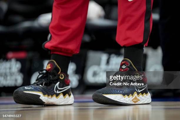 Detail is pictured of the sneakers worn by Kevin Love of the Miami Heat before the game against the Detroit Pistons at Little Caesars Arena on March...