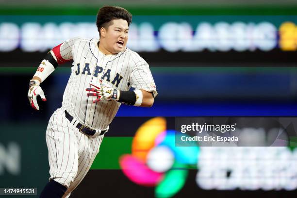 Munetaka Murakami of Team Japan celebrates after hitting a two-run double to defeat Team Mexico 6-5 in the World Baseball Classic Semifinals at...