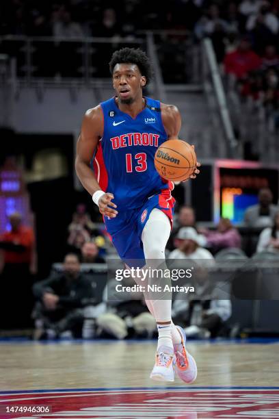 James Wiseman of the Detroit Pistons handles the ball against the Miami Heat at Little Caesars Arena on March 19, 2023 in Detroit, Michigan. NOTE TO...