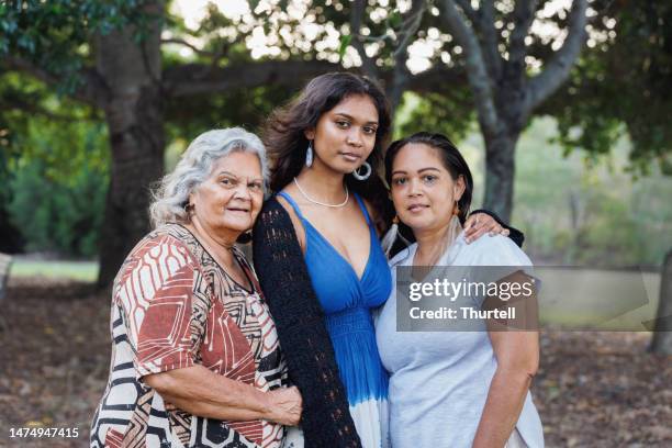 multi-generational indigenous australian family, three generations of aboriginal australian women - origin stock pictures, royalty-free photos & images