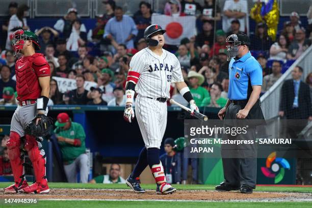 Munetaka Murakami of Team Japan reacts after striking out against Team Mexico during the World Baseball Classic Semifinals at loanDepot park on March...