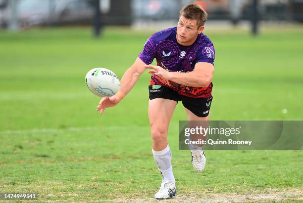 Harry Gran of the Storm passes the ball during a Melbourne Storm NRL training session at Gosch's Paddock on March 21, 2023 in Melbourne, Australia.