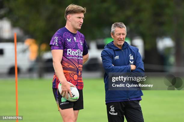 Jordie Barrett of the All Blacks speaks to Craig Bellamy the coach of the Storm during a Melbourne Storm NRL training session at Gosch's Paddock on...