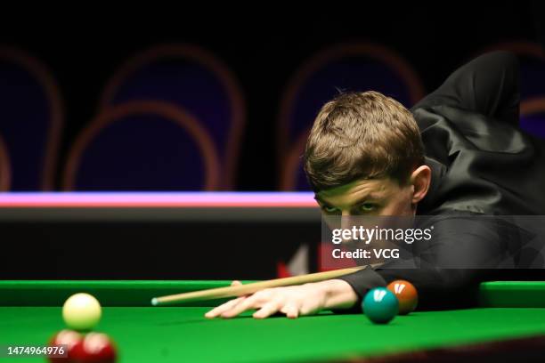 James Cahill of England plays a shot in the second round match against Shaun Murphy of England on day 5 of 2023 WST Classic at the Morningside Arena...