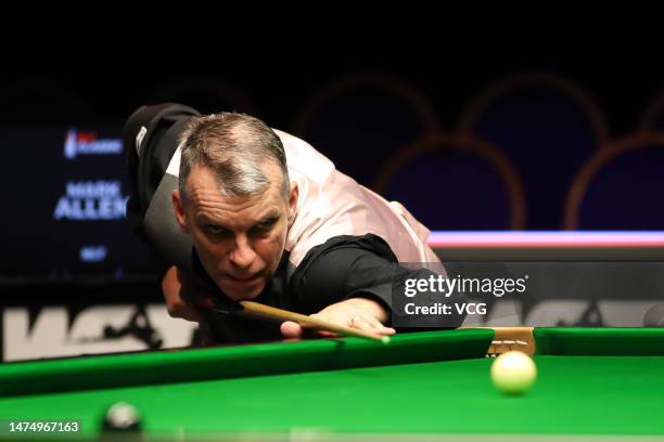 Mark Davis of England plays a shot in the second round match against Mark Allen of England on day 5 of 2023 WST Classic at the Morningside Arena on...