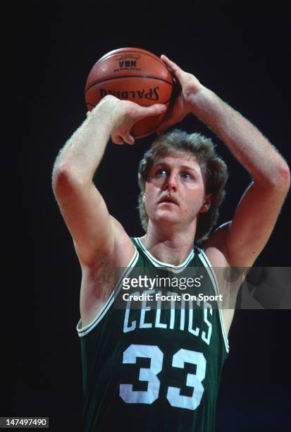 Larry Bird of the Boston Celtics shoot during an NBA basketball game circa 1985. Bird played for the Celtics from 1979 - 92.
