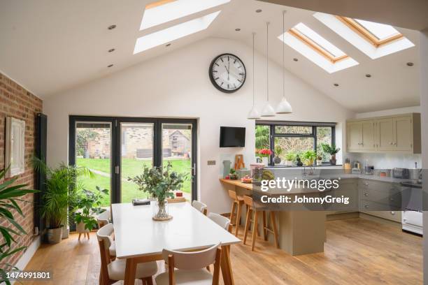 modern open plan home with natural light - kitchen window stock pictures, royalty-free photos & images