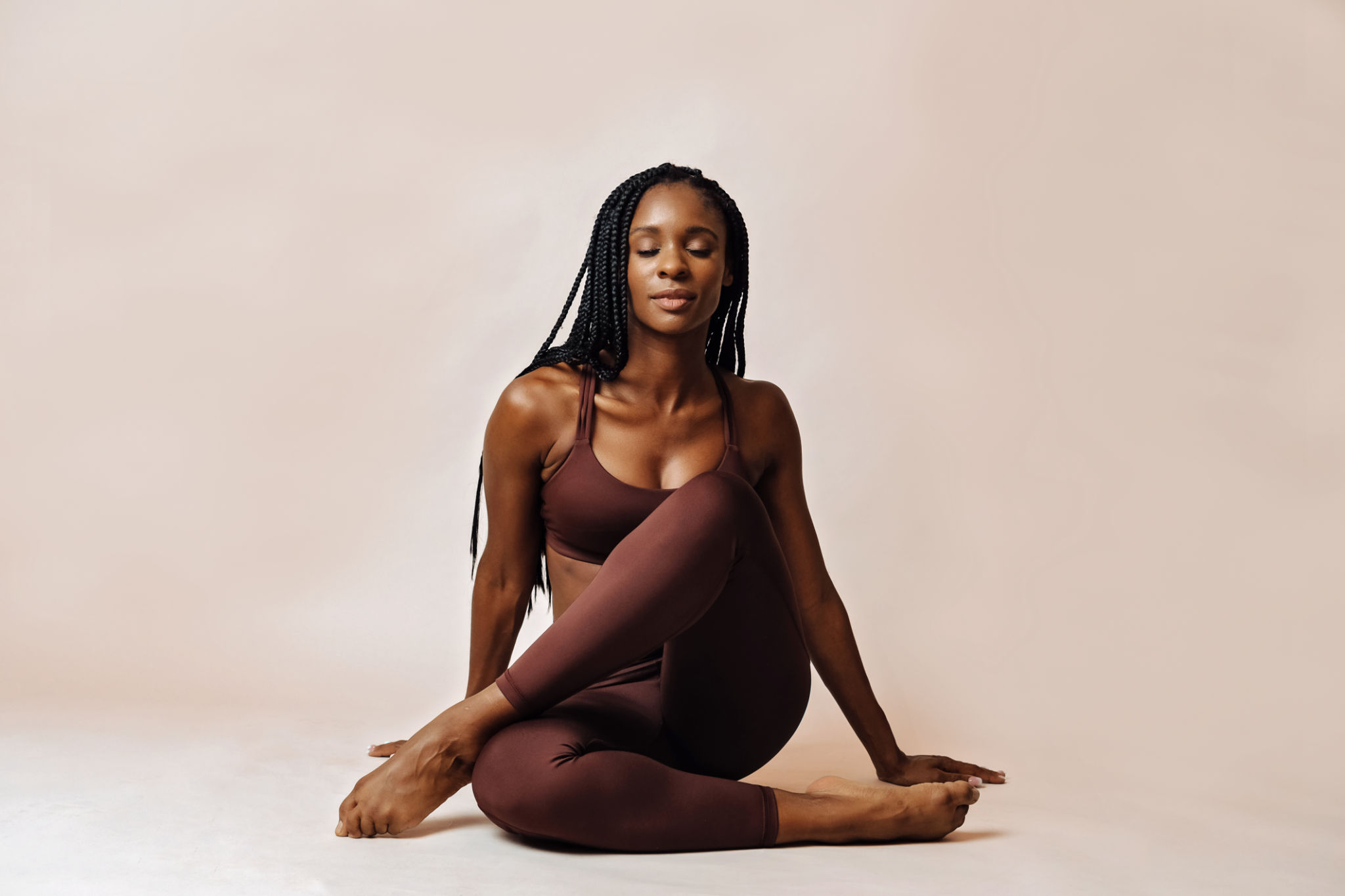 woman in lotus pose yoga studio woman in lotus pose yoga studio