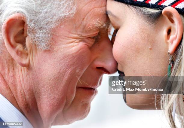 King Charles III performs a 'Hongi' with a member of the Ngti Rnana London Mori Club as he attends the 2023 Commonwealth Day Service at Westminster...