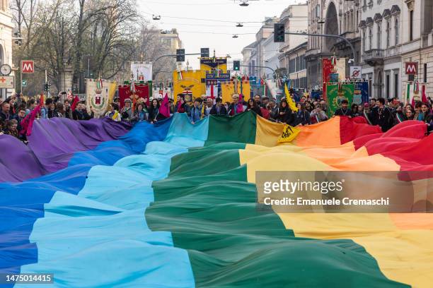 Scouts wave a giant peace flag as they take part in a demonstration organized by Libera, on the occasion of the 'National Day of Remembrance and...