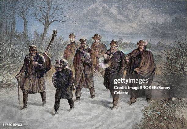 musikkapelle im schnee, germany, historical woodcut, circa 1870, digitally restored reproduction of an original 19th century print, exact original date unknown, coloured - street musician stock illustrations