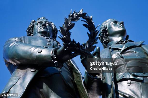 goethe- und schiller-denkmal, weimar - statue of goethe stock-fotos und bilder