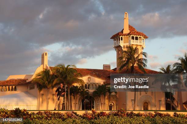 Secret Service agent guards the Mar-a-Lago home of former President Donald Trump on March 21, 2023 in Palm Beach, Florida. Trump said on a social...