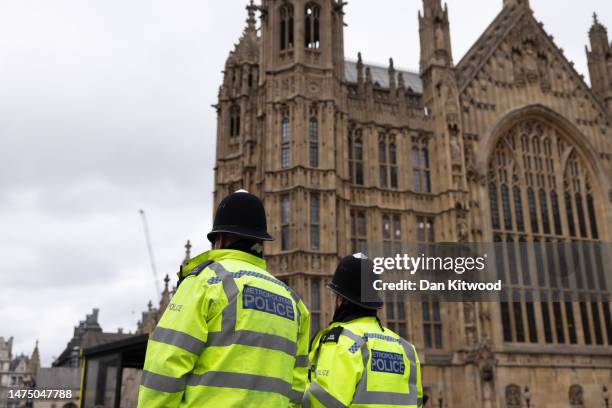 Metropolitan Police officers outside the Houses of Parliament on March 21, 2023 in London, England. A report published today of behavioural standards...