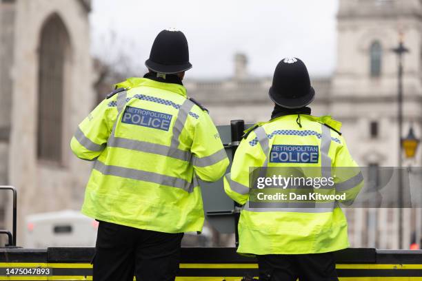 Metropolitan Police officers outside the Houses of Parliament on March 21, 2023 in London, England. A report published today of behavioural standards...