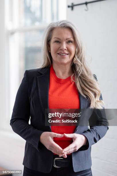 confident businesswoman portrait - employee office happy stock pictures, royalty-free photos & images