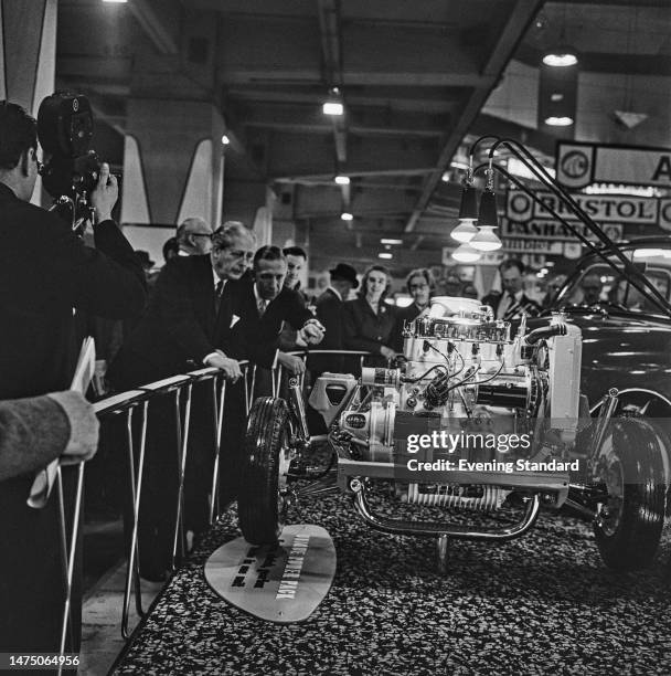 British Prime Minister Harold Macmillan attends the opening of the British International Motor Show at Earls Court in London on October 21st, 1959.