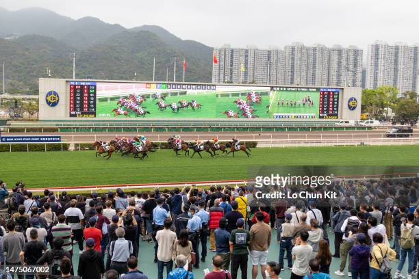 Jockeys compete in the Race 6 Werther Handicap at Sha Tin Racecourse during the BMW Hong Kong Derby Race Day on March 19, 2023 in Hong Kong.