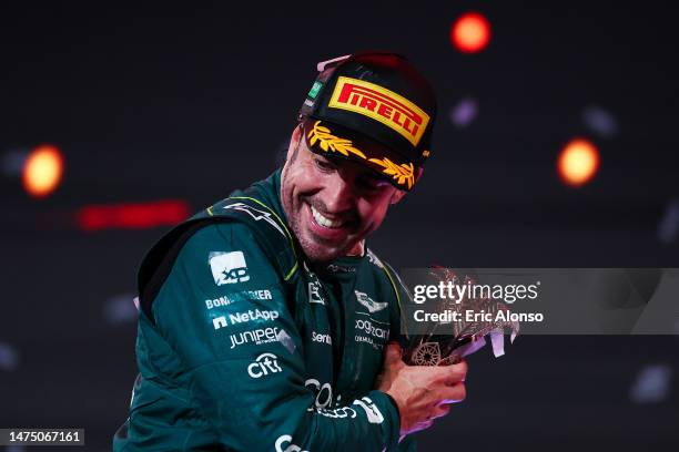 Third placed Fernando Alonso of Spain and Aston Martin F1 Team celebrates on the podium during the F1 Grand Prix of Saudi Arabia at Jeddah Corniche...