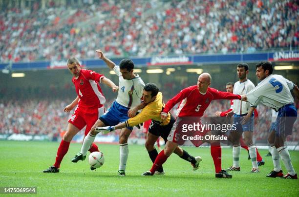 March 2003, Cardiff - International Football - EUROs 2004 Qualifier - Wales v Azerbaijan - Andrew Melville of Wales, Tarlan Akhmedov of Azerbaijan,...