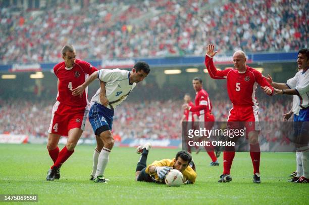 March 2003, Cardiff - International Football - EUROs 2004 Qualifier - Wales v Azerbaijan - Andrew Melville of Wales, Tarlan Akhmedov of Azerbaijan...