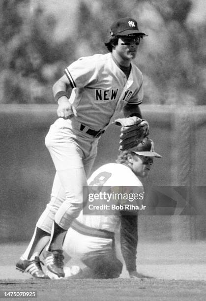 Yankees Bucky Dent gets Angels Merv Rettenmund out at 2nd Base during game between the California Angels against New York Yankees, July 15, 1979 in...