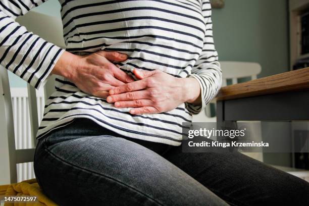 pain - ovarian cancer stock pictures, royalty-free photos & images