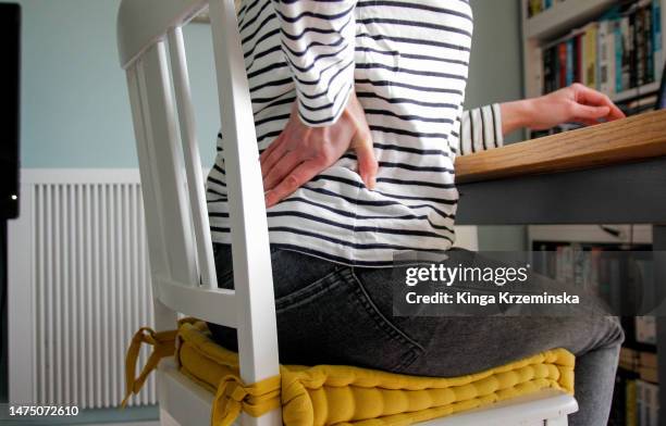 back pain - rheumatism stock pictures, royalty-free photos & images