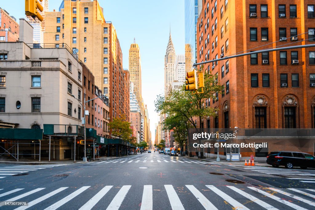 Street in Manhattan Downtown with Crysler Building, New York City, USA