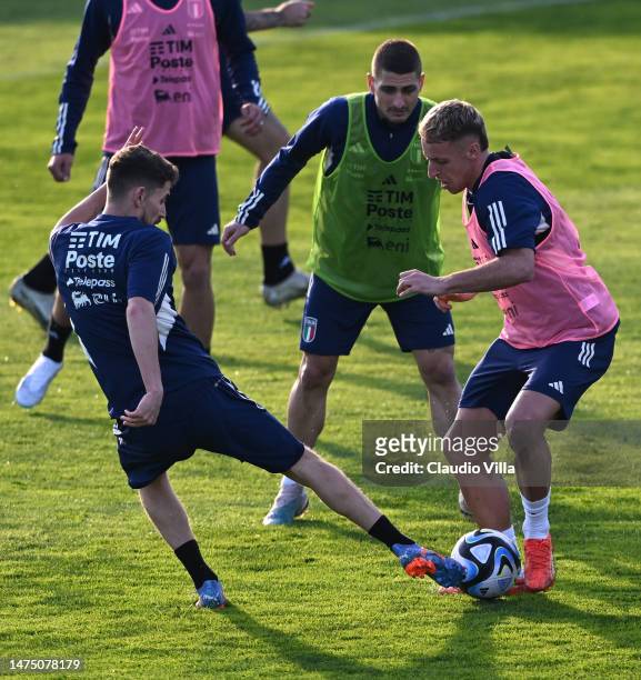 Jorginho and Davide Frattesi of Italy in action during a training session at Centro Tecnico Federale di Coverciano on March 21, 2023 in Florence,...