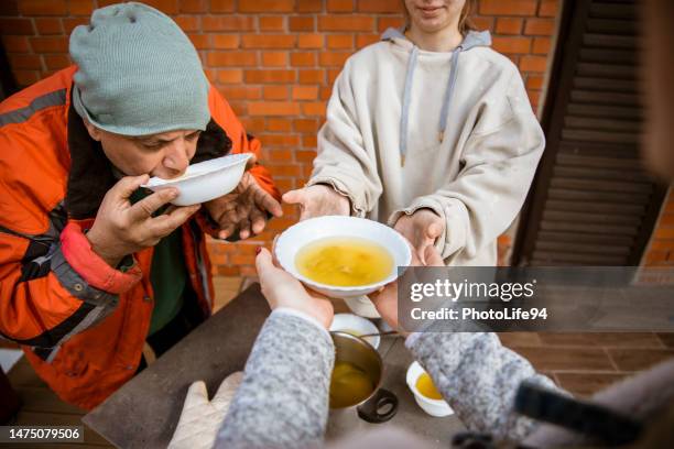 donate food to people - malnutrition stock pictures, royalty-free photos & images