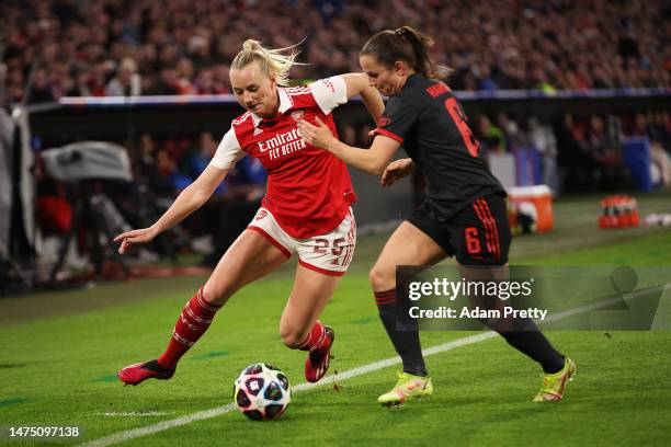 Stina Blackstenius of Arsenal and Tuva Hansen of FC Bayern München battle for the ball during the UEFA Women's Champions League quarter-final 1st leg...