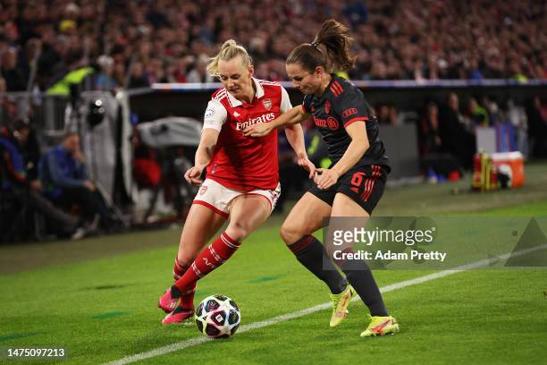 Stina Blackstenius of Arsenal and Tuva Hansen of FC Bayern München battle for the ball during the UEFA Women's Champions League quarter-final 1st leg...