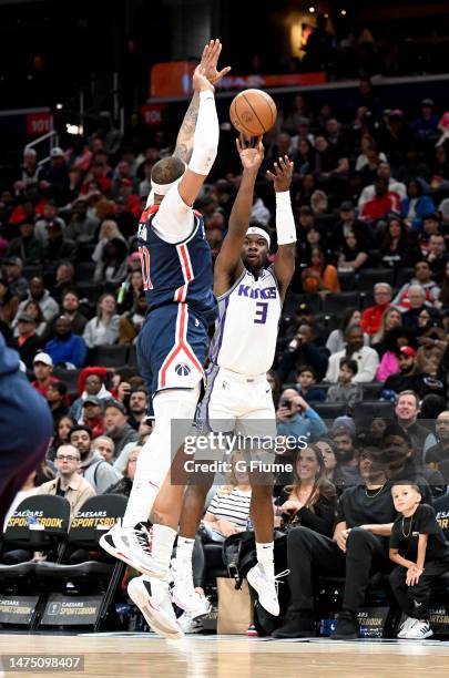 Terence Davis of the Sacramento Kings shoots the ball against the Washington Wizards at Capital One Arena on March 18, 2023 in Washington, DC. NOTE...