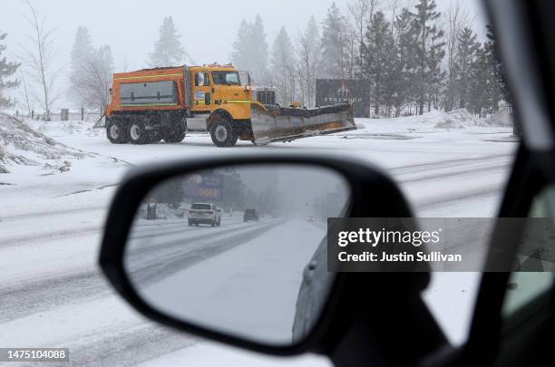 Snowplow prepares to plow a road on March 21, 2023 in Stateline, Nevada. The Lake Tahoe region is preparing for more snow in the coming days after...