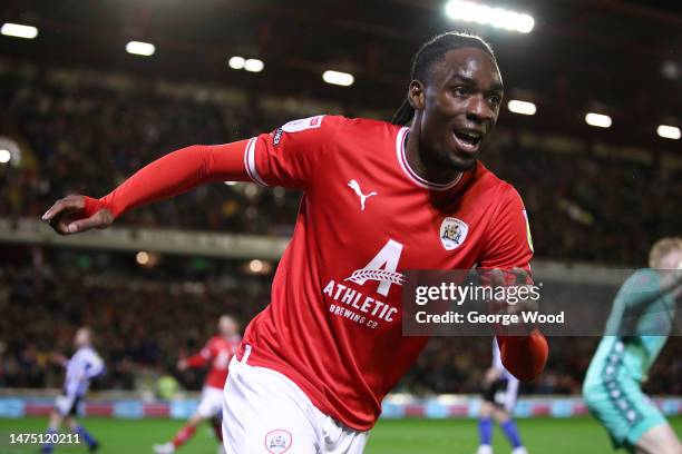 Devante Cole of Barnsley celebrates after scoring the team's first goal during the Sky Bet League One between Barnsley and Sheffield Wednesday at...