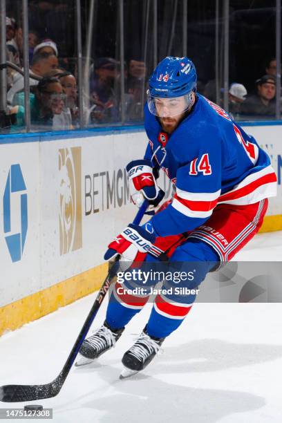 Tyler Motte of the New York Rangers skates with the puck against the Nashville Predators at Madison Square Garden on March 19, 2023 in New York City.