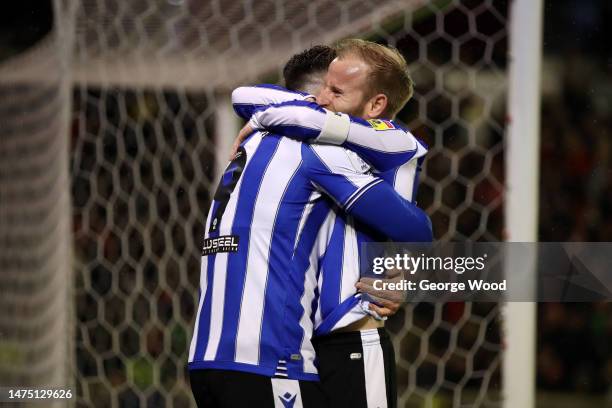 Lee Gregory of Sheffield Wednesday celebrates with teammate Barry Bannan after scoring the team's second goal during the Sky Bet League One between...