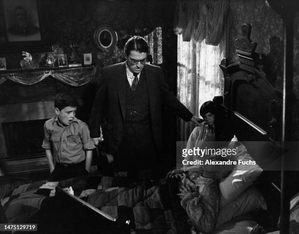 Actors Gregory Peck, Philip Alford and actress Mary Badham in a scene of the film "To Kill A Mockingbird", in 1961 at Monroeville, Alabama.