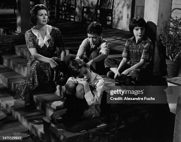 Actors John Megna and Philip Alford and actresses Mary Badham and Rosemary Murphy in a scene of the film "To Kill A Mockingbird", in 1961 at...