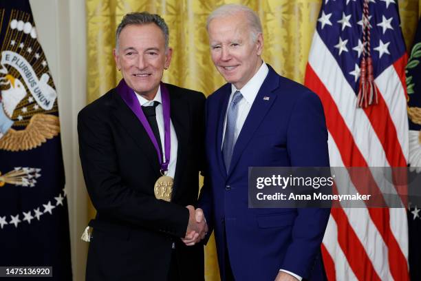 President Joe Biden awards singer Bruce Springsteen a 2021 National Medal of Art during a ceremony in the East Room of the White House on March 21,...