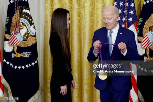 President Joe Biden awards fashion designer Vera Wang a 2021 National Medal of Art during a ceremony in the East Room of the White House on March 21,...