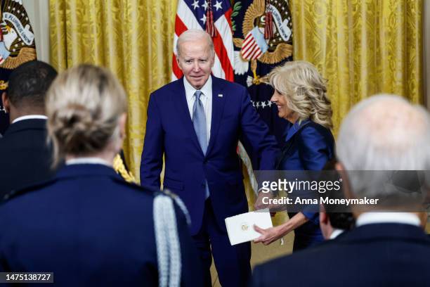 President Joe Biden and first lady Jill Biden depart from a ceremony honoring the recipients of the 2021 National Humanities Medals and the 2021...