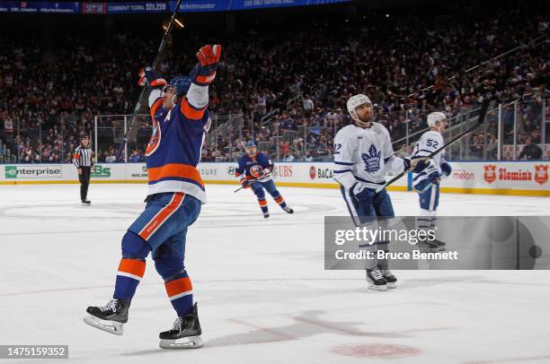 Cal Clutterbuck of the New York Islanders celebrates his second period goal against the New York Islanders at the UBS Arena on March 21, 2023 in...