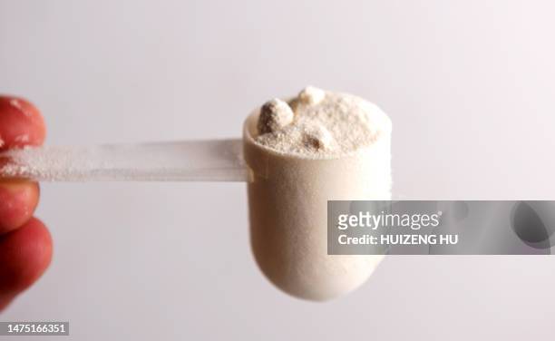 expired clumped milk powder - powdered milk stock pictures, royalty-free photos & images