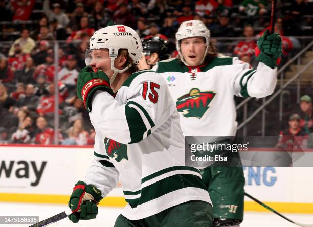Mason Shaw of the Minnesota Wild celebrates his goal during the third period against the New Jersey Devils at Prudential Center on March 21, 2023 in...