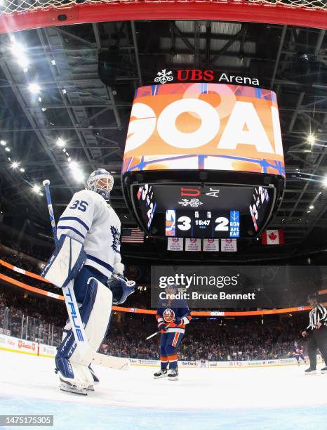 Ilya Samsonov of the Toronto Maple Leafs looks back at the net after giving up a goal to Cal Clutterbuck of the New York Islanders during the third...