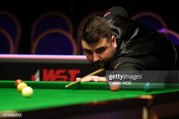 Jamie Clarke of Wales plays a shot in the third round match against John Higgins of Scotland on day 6 of 2023 WST Classic at the Morningside Arena on...